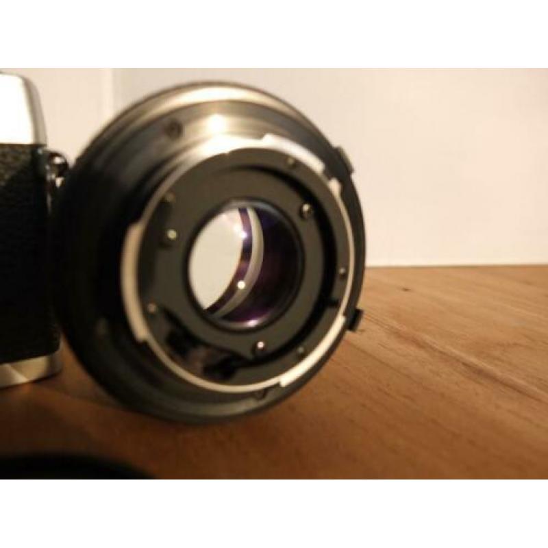 SLR * Minolta XG 1 & MD 50 mm lens * GETEST * TOP