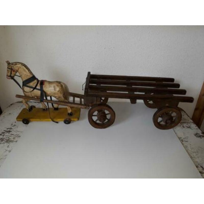 Antiek speelgoed paard en wagen paardje. 1920