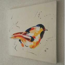 Schilderij met afbeelding van een kleurrijke vogel. 50x50x3.