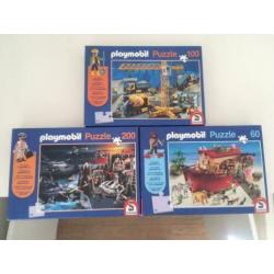 Drie playmobil puzzels